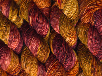 Close-up of skeins of yarn with autumnal colors.